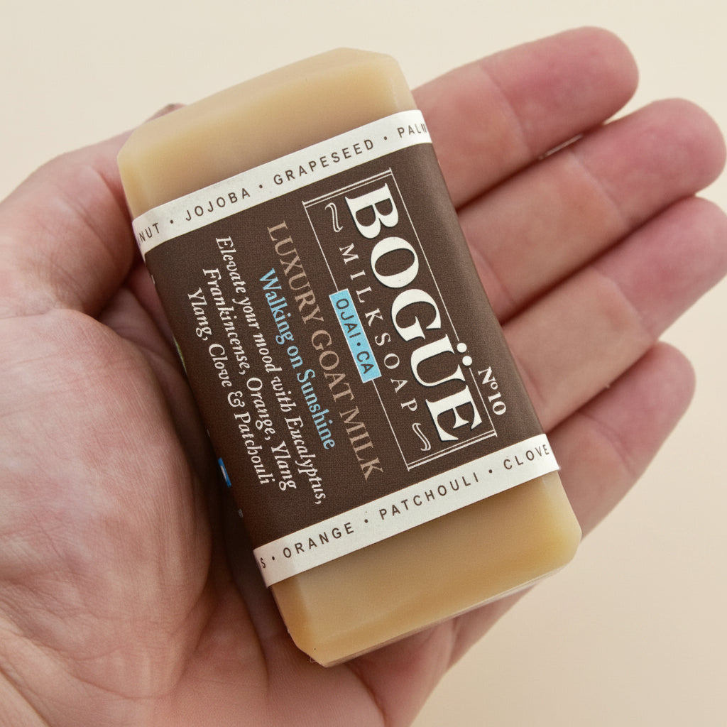 Frankincense Eucalyptus and Ylang Ylang large goat milk soap in hand for size