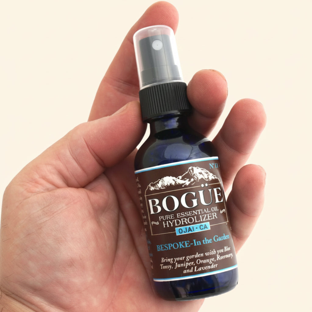 herbal garden essential oil spray in hand 2oz for size