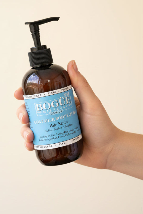 palo santo lotion in hand 8oz size