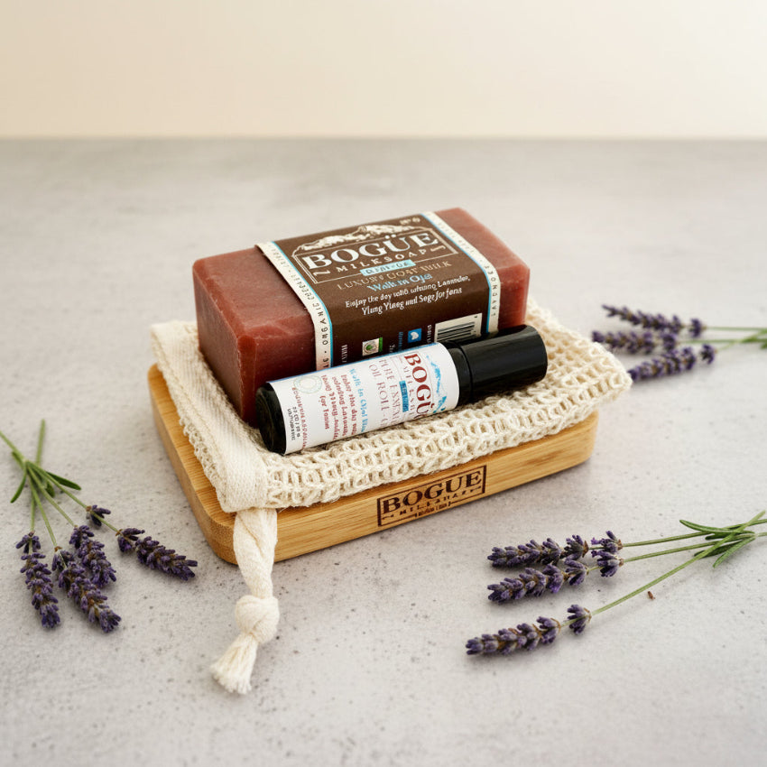 lavender soap and essentia oil gift set on tray with loth
