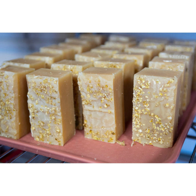 raw oatmeal goat milk soap curing on tray