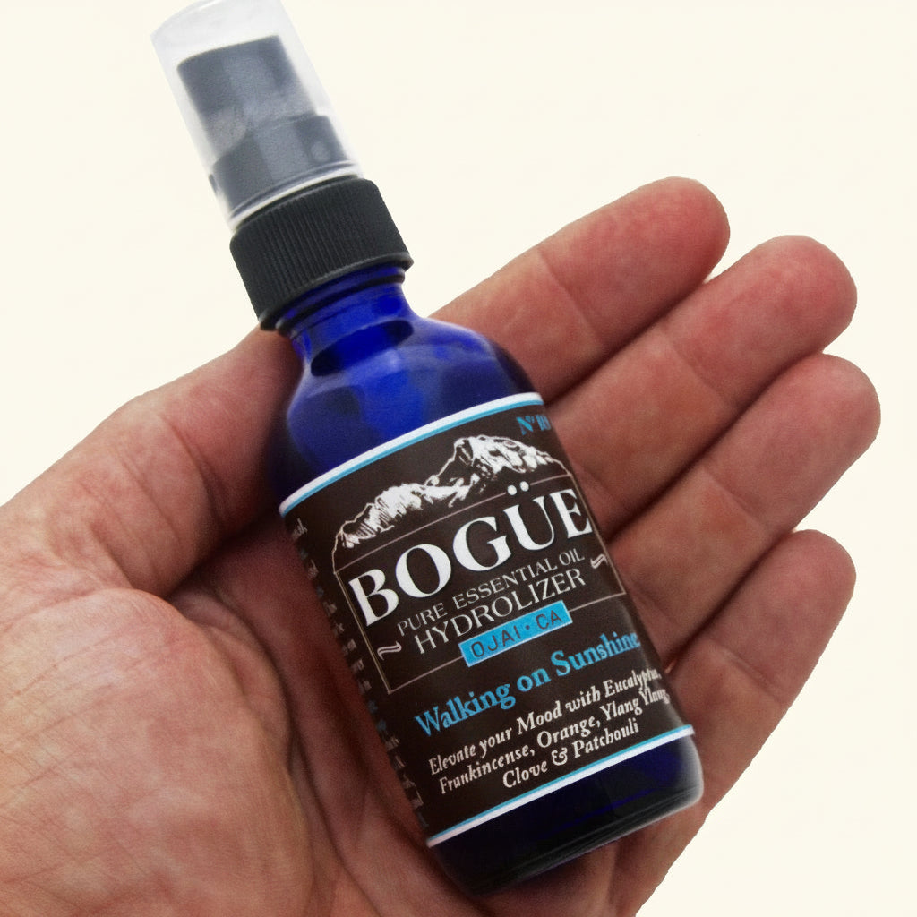 Frankincense essential oil spray in hand 2oz for size