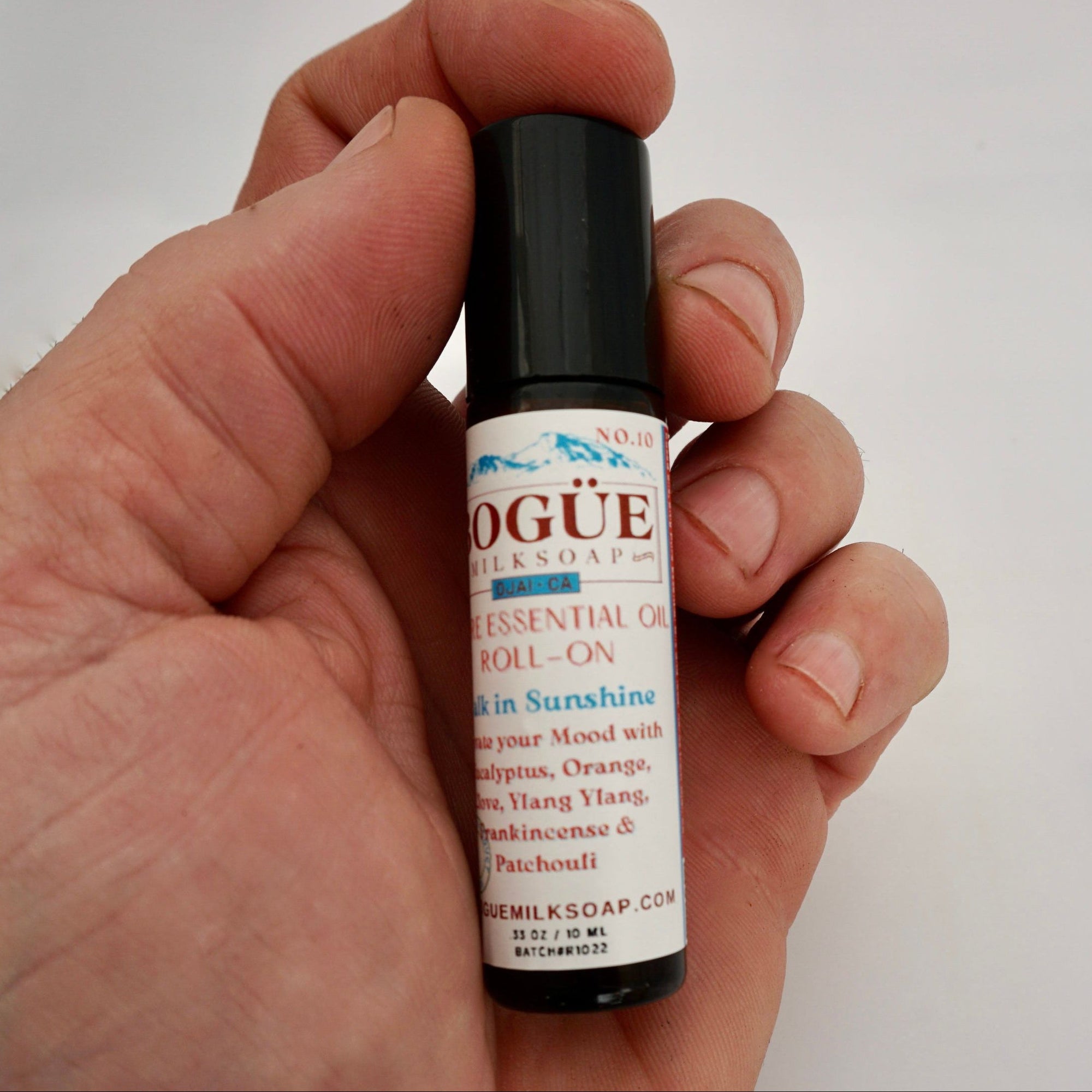 Frankincense essential oil roll-on in hand 10ml for